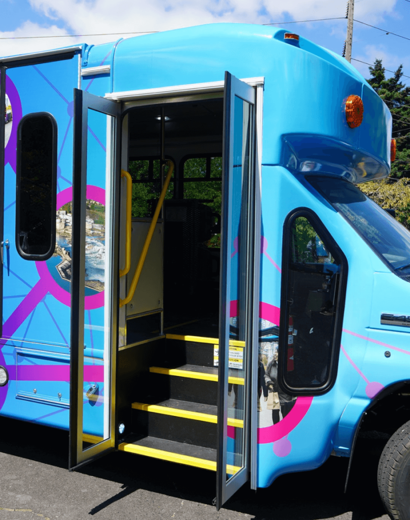 Bus doors open with steps to board the ClackCo shuttle
